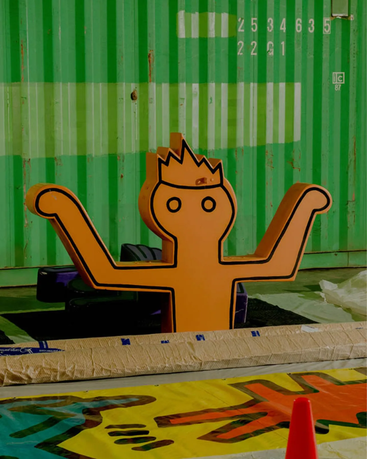 A Keith Haring carousel figure in storage before restoration