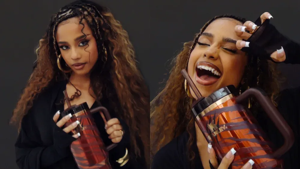 Tyla holding a Stanley Quencher tumbler